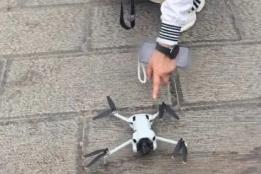 弥勒锦屏山庙会：游客无人机违规飞行被民警批评教育